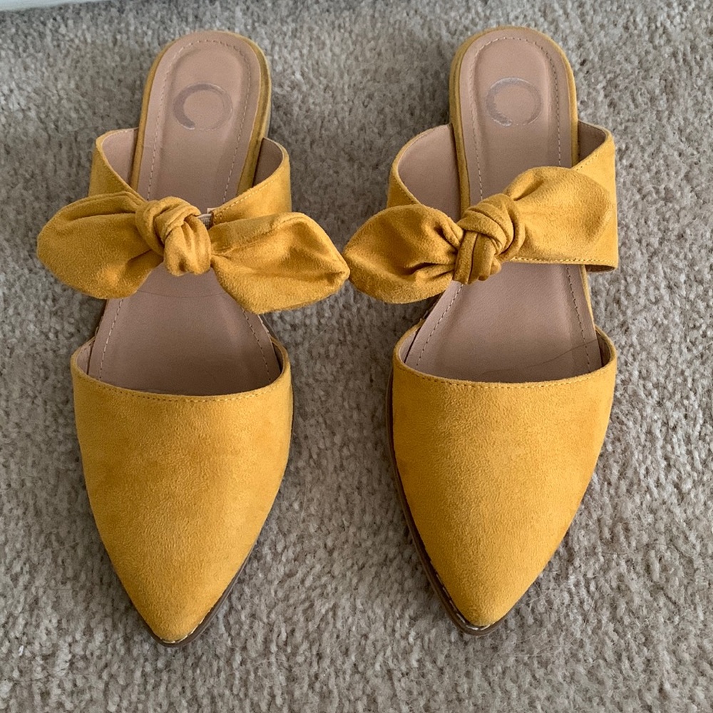 Yellow mule flats with bow